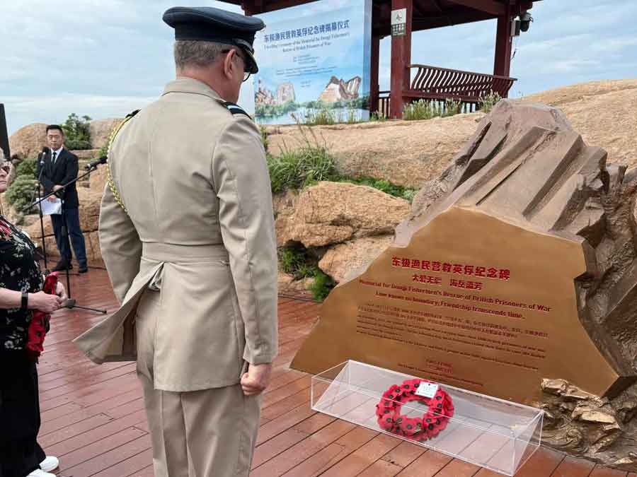 The British Defence Attaché in Beijing, Air Commodore Don Stamp, laying a wreath at the unveiling of the Zhoushan memorial on 20th May 2025 to commemorate the fishermen who rescued hundreds of POWs from the sinking of the Lisbon Maru in 1942. Photograph courtesy of Kent Shum.