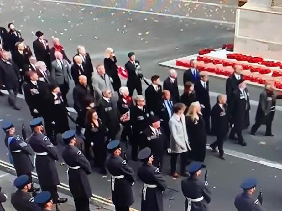 Members of the Lisbon Maru Memorial Association march by the Cenotaph on Remembrance Sunday 9th November 2025