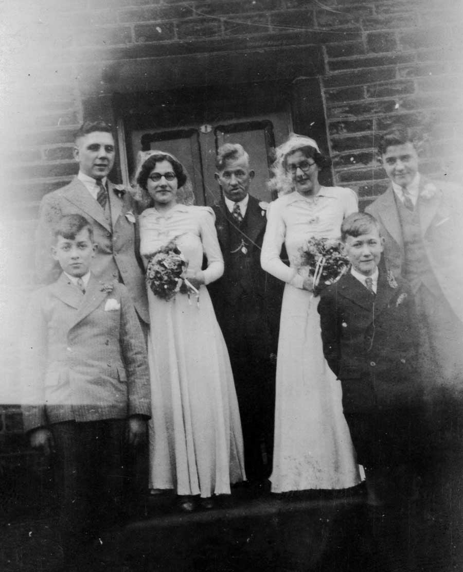 George Boothroyd’s sister Mary and Reggie Sykes wedding. Left to Right Reggie, Mary, George's father George Boothroyd Snr, George's sister Bessie, George Boothroyd. George's brothers John (left) and Alec (right) are to the front.