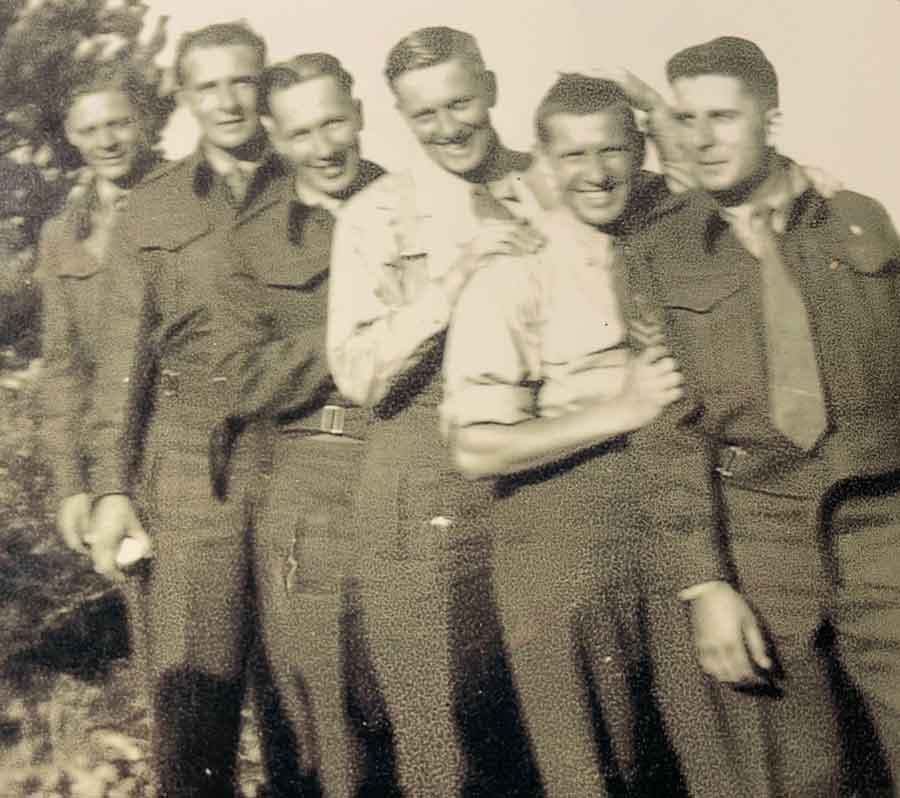 Avery White who survived the sinking of the Lisbon Maru is on the far right of the photograph.